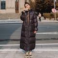 A medium-length cotton coat of lamb wool with an elegant and attractive shape, high quality, and it is characterized by being one of the latest contemporary designs A medium-length cotton coat of lamb wool with an elegant and attractive shape, high quality, and it is characterized by being one of the latest contemporary designs