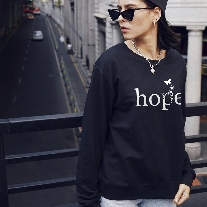 Sweet design, high quality women's t-shirt, designed of pure cotton, with long sleeves, with a graphic middle Sweet design, high quality women's t-shirt, designed of pure cotton, with long sleeves, with a graphic middle