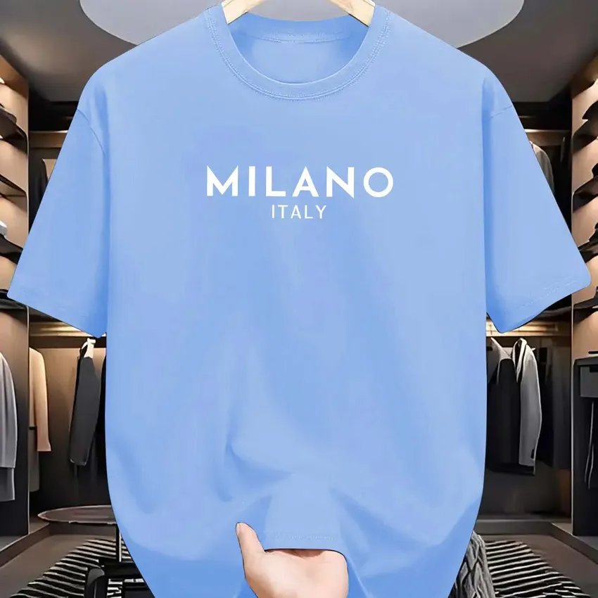 Summer men's t -shirt is 100% of pure cotton, loose and modern, printed with Italian Milan letters with circular neck and short sleeves Summer men's t -shirt is 100% of pure cotton, loose and modern, printed with Italian Milan letters with circular neck and short sleeves