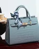 Modern women's shoulder bag elegant large handbag in air crocodile style soft quality 2024 mom mystery with a new design Modern women's shoulder bag elegant large handbag in air crocodile style soft quality 2024 mom mystery with a new design