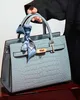 Modern women's shoulder bag elegant large handbag in air crocodile style soft quality 2024 mom mystery with a new design Modern women's shoulder bag elegant large handbag in air crocodile style soft quality 2024 mom mystery with a new design