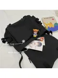 A single -shoulder and multi -use gynecological crossbar bag with a large cap A single -shoulder and multi -use gynecological crossbar bag with a large cap